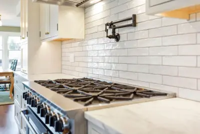 Vintage White Shaker Inset by Signature Design & Cabinetry LLC