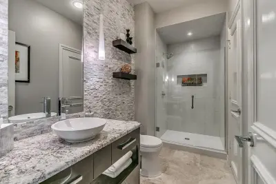 Elegant Stone Washroom — Custom Cabinets & Cabinetry project by Baths And Rooms By Denise