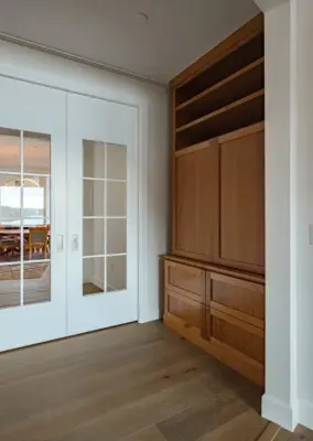 Custom Bookshelf and Fireplace Installations by Signature Design & Cabinetry LLC