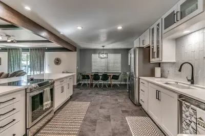 Modern White Culinary Space — Custom Cabinets & Cabinetry project by Baths And Rooms By Denise