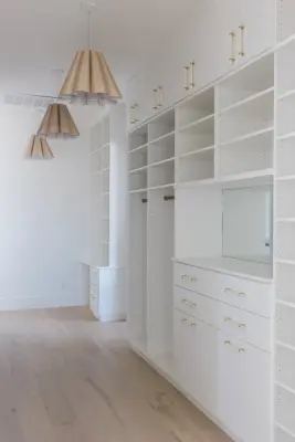 Slim Elegant Passageway Storage — Custom Cabinets & Cabinetry project by Classy Closets