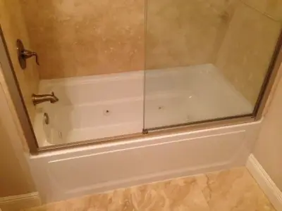 Bathtub and Shower Enclosures — Custom Cabinets & Cabinetry project by The Stone Shop
