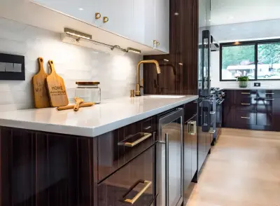 Contemporary Shine with Golden Highlights — Custom Cabinets & Cabinetry project by Signature Design & Cabinetry LLC