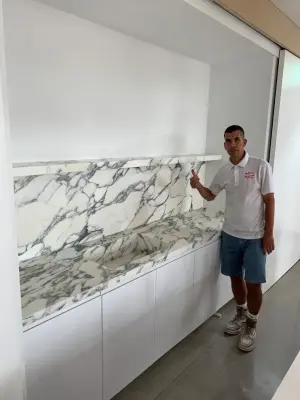 Bespoke marble countertop with integrated sink and complete backsplash for office by CMG Granite And Stone Inc.
