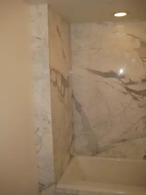 Calcutta Gold Marble Slabs for Bathroom Shower by LaBruyere Stone