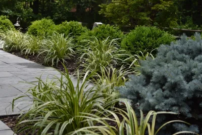 PA Fieldstone seat wall with fire pit — Landscape Design project by Bruno Design Associates