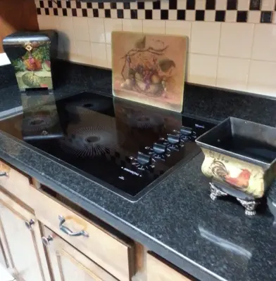 Black Pearl Granite Countertop - Revitalizing an Older Kitchen — Countertop Installation Services project by Granite 4 Less