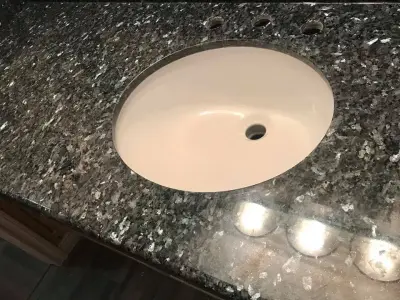 Blue Pearl Countertops with Complete Bullnose Edge by Stones & Designers