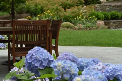 Retaining wall with fire pit seat wall — Landscape Design project by Bruno Design Associates in Chester