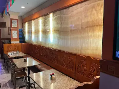 Illuminated Onyx Wall — Countertop Installation Services project by Granite Makeover