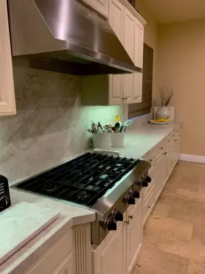 Taj Mahal Quartzite Kitchen Countertop Slab Arrangement — Countertop Installation Services project by CMG Granite And Stone Inc.