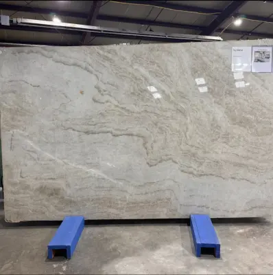 Taj Mahal Polished Quartzite Kitchen and Fireplace Renovation — Countertop Installation Services project by Euroselect Stone LLC