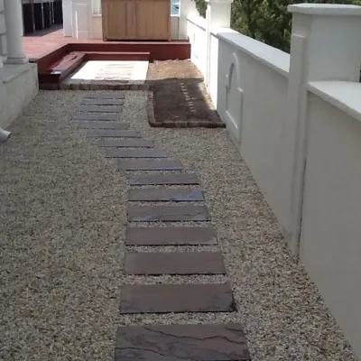Pebbled Pathway — Landscape Construction project by Kãsa Landscaping & Property Management
