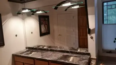 Stone Bathroom Countertops — Countertop Installation Services project by Creative Surfaces Countertops
