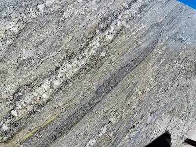 2017 Fresh Brazilian Marble Slabs — Countertop Installation Services project by Rivers' Edge Countertops