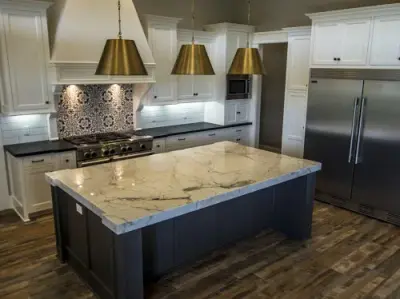Contemporary Farmhouse with Calacatta Quartzite Kitchen by Granite Division Inc.