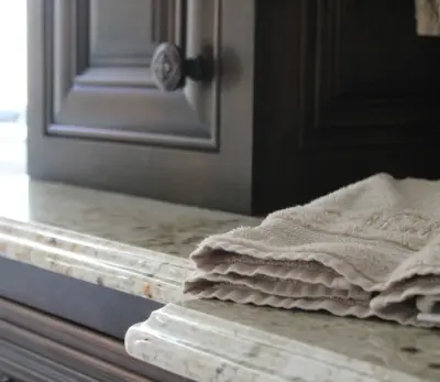 Ashland Luxury Bathroom Renovation with Granite Counters and Makeup Vanity — Countertop Installation Services project by Bison Countertops