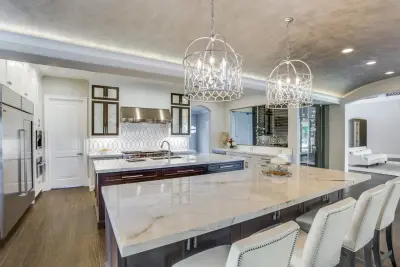 Backlit Onyx Gameroom with Transitional Design and Calacatta Marble Kitchen by Aria Stone Gallery