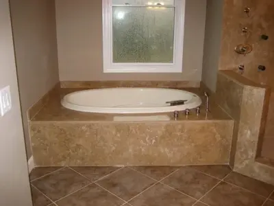 Restrooms — Countertop Installation Services project by Celtic Marble And Granite