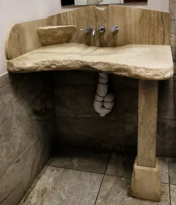Restrooms — Countertop Installation Services project by Phenix Marble Company