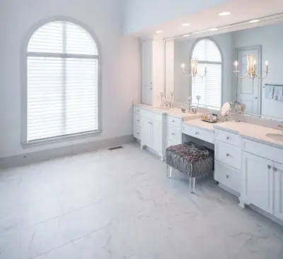Elegant Marble Bathroom — Countertop Installation Services project by Classic Carpets And Interiors, Inc.