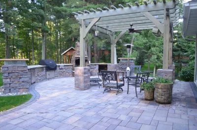 Outdoor kitchen and firepit — Landscape Construction project by Landsburg Landscape Nursery