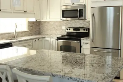 Antique White Granite by Merlino Marble And Granite