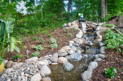 Lakeside waterfall — Landscape Construction project by Landsburg Landscape Nursery