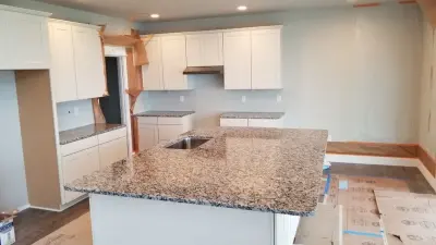 Frosted Bianco Granite Countertops — Countertop Installation Services project by Tops Solid Surface