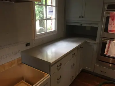 Williamsburg Circle Transitional Cooking Space — Countertop Installation Services project by Birmingham Concrete Design, Inc