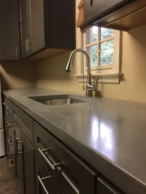 Laundry Room on Orleans Road — Countertop Installation Services project by Birmingham Concrete Design, Inc