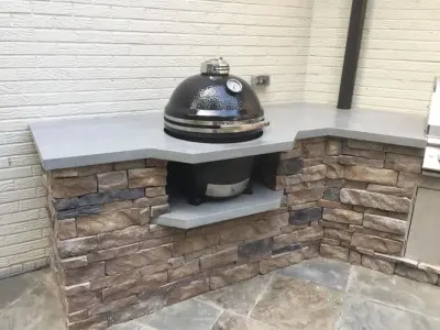 Outdoor Kitchen at English Village — Countertop Installation Services project by Birmingham Concrete Design, Inc