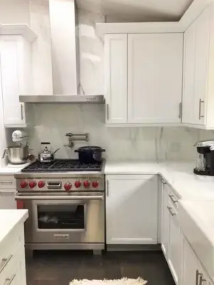 CALACATTA LUXURY KITCHEN — Countertop Installation Services project by Avanti Marble & Granite Inc.