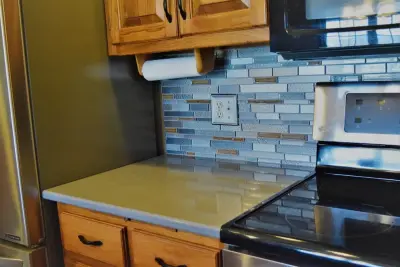 Contemporary Rustic Kitchen and Utility Space Renovation — Countertop Installation Services project by Kemper Flooring Inc.