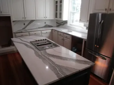 Cambria Countertops and Full-Height Backsplash — Countertop Installation Services project by Stone Interiors LLC