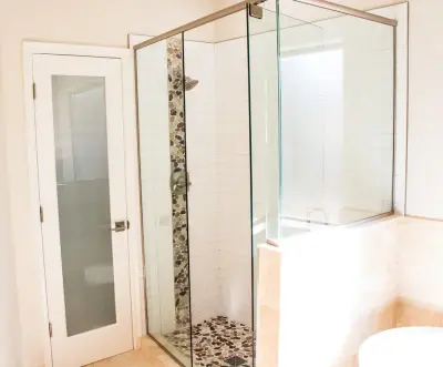 Cobblestone bathroom remodel addition — Countertop Installation Services project by New Creation Flooring