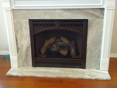 Fireplace Solutions — Countertop Installation Services project by Tops Solid Surface