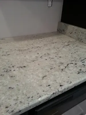 Colonial Ivory Granite — Countertop Installation Services project by Granite 4 Less