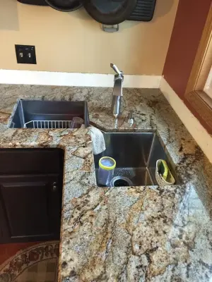 Modern Kitchen Renovation — Countertop Installation Services project by Nature's Stone Direct