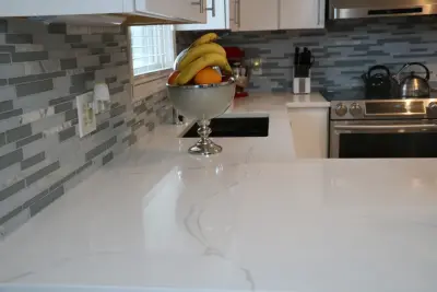 Calcutta Quartz Surface by Gomez Granite Countertops