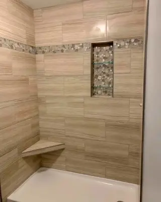 Charming Bubbly Shower Renovation — Countertop Installation Services project by Kemper Flooring Inc.