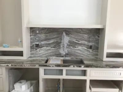 Bookmatched Fantasy Brown Kitchen — Countertop Installation Services project by Granite Makeover