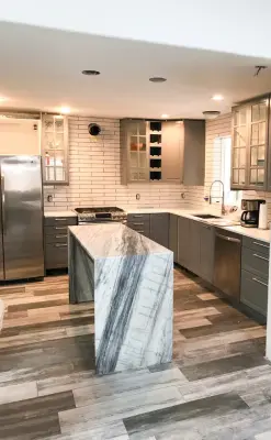 Granite Countertop with Waterfall Design — Countertop Installation Services project by Nelson Tile And Stone