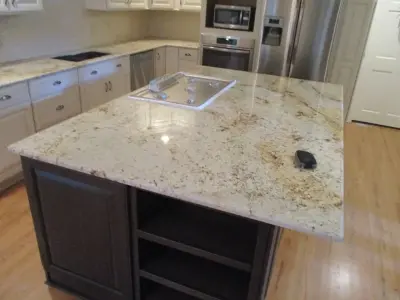 Granite Countertop and Island for Kitchens — Countertop Installation Services project by Stone Interiors LLC
