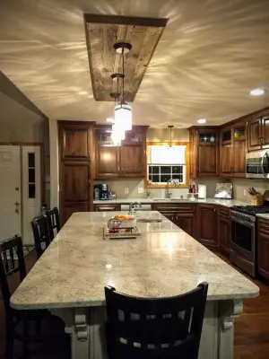 Millenium Cream Granite Kitchen Renovation — Countertop Installation Services project by Mid Missouri Surfaces