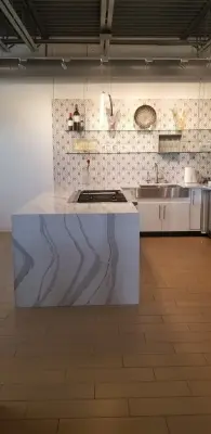 Custom Waterfall Countertop for Industrial Kitchen by Sandia Marble