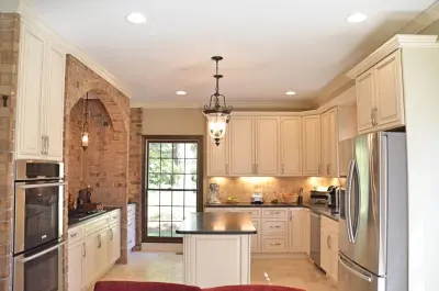 Brown Antique Leathered Kitchen — Countertop Installation Services project by Bolder Granite