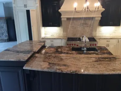 Magma Gold Kitchen — Countertop Installation Services project by Bolder Granite