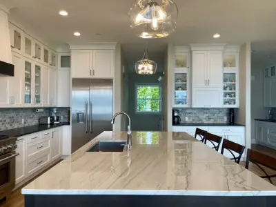 Quartzite Island Kitchen — Countertop Installation Services project by American Marble & Granite