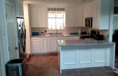 Modern White Kitchen — Countertop Installation Services project by Affordable Granite Inc